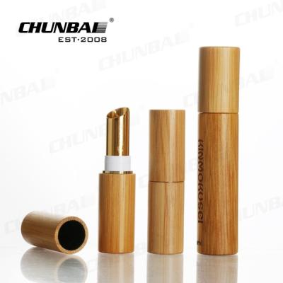 China Chinese Packaging Factory Frosted 100ml Cosmetic Essential Oil Glass Wood Bottles Wood With Bamboo Cap for sale