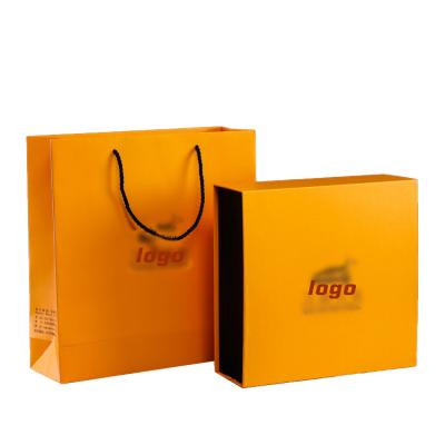 China Custom Recyclable Luxury Orange Magnetic Book Shape Color Logo BOWEN Foldable Cardboard Box For Gift Packing for sale