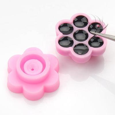 China Wholesale Eco-friendly Adhesive Cup Disposable Glue Extension Eyelash Glue Tray Holder With 7holes for sale