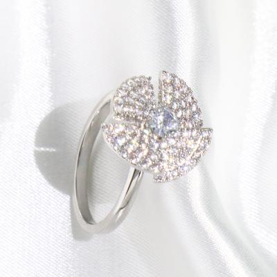 China Beautiful CLASSIC Fashionable Elegant Rotating Jewelry Women's Zircon Flower Rings For Girls for sale