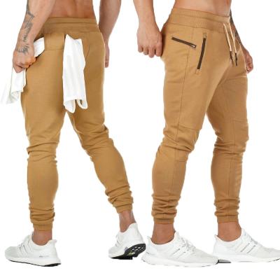 China 2021 Hot Selling Breathable Athletic Track Joggers Workout Running Pants With Zipper Pockets And Towel Loop for sale