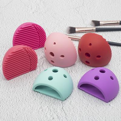 China 2022 Portable Rechargeable Silicone Washboard Silicone Makeup Brush Hot Selling Egg Shaped Cosmetic Cleaning Pad for sale