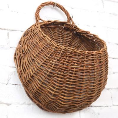 China Natural Wicker Hanging Basket Woven Handmade Viable Storage Basket for Garden Wedding Wall Decoration for sale