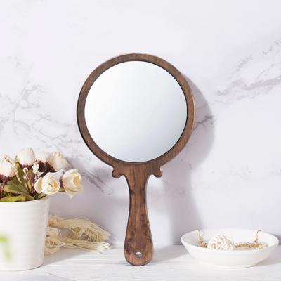 China Europe Wood Mirror with Handle - 5.5 Inch Round Small Handheld Makeup Natural Wood Mirror with Hanging Hole for Travel Table Top for sale