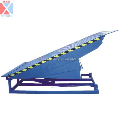 China Loading and unloading cargo 8 ton electric stationary hydraulic dock leveler, loading dock ramp leveler for sale