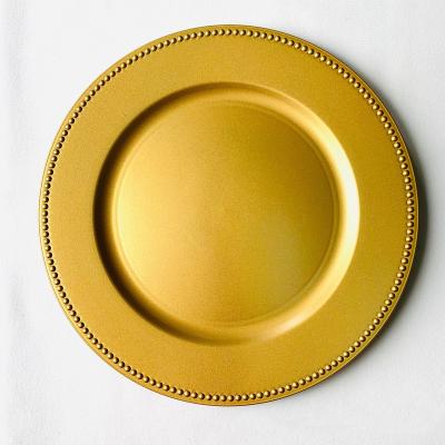 China Disposable Wedding 13in Decorative Round Disposable Gold Foil Plastic Charger plate with gold beads for event Dinner Plate for sale