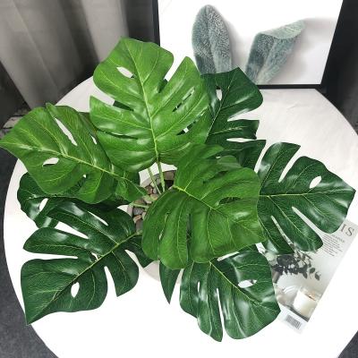 China Cheap Wholesale Eco-friendly 9 Heads NWYZ-12-6 Tall Tissue Monstera Leaf Artificial Deliciosa Plants Decoration for sale