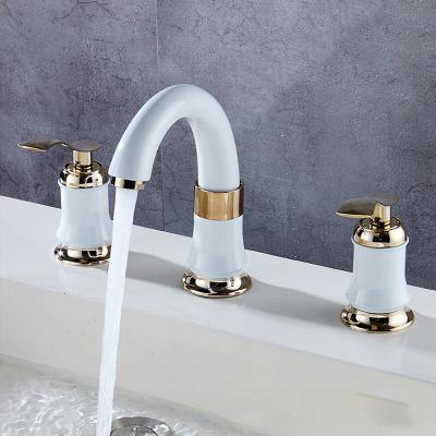 China Dual Handle Copper Double Handle Basin Faucet White Three Piece Dual Handle Bathtub Shower Faucet Basin Lavatory Faucet for sale