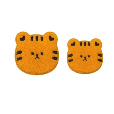 China Viable Wholesale Custom Tiger Pattern Ventralex Patch Badges Iron On Towel Embroidery Patches For Clothing for sale