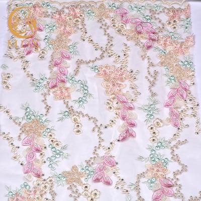 China viable OME most popular embroidery textile raw materials spinning net lace dress fabric for sale