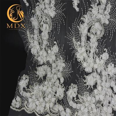 China 100% viable unique handmade beaded sequin embroidery designs with 3d flowers and rhinestones for wedding dress bridal white french lace for sale