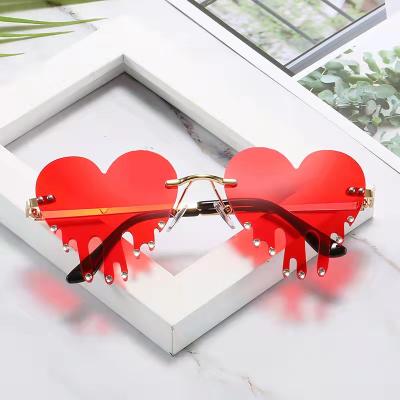 China Partying Glasses 2021 Wholesale Rimless Women Heart Sunglasses Fashion Eyewear Diamond Party Glasses Men for sale