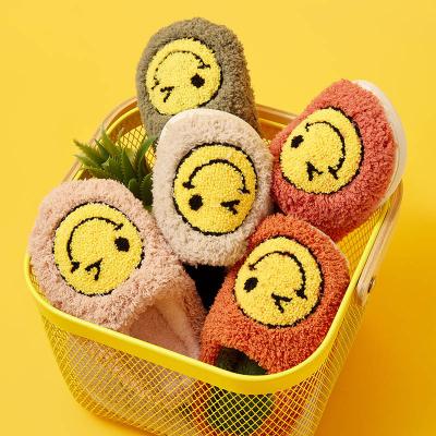 China Cute Smile Smiley Face Winter Bedroom Slippers Fuzzy Happy Slides Warm Furry Wholesale Light Home Unisex Indoor Bedroom for Kids for sale