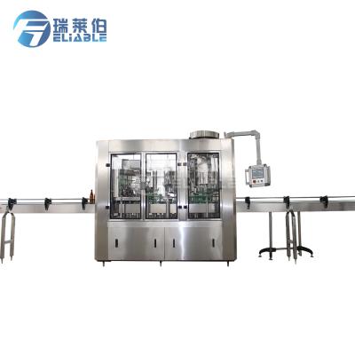 China Food Drink Glass Automatic Medium Capacity Carbonated Non-Carbonated Bottle Filling Machine for sale