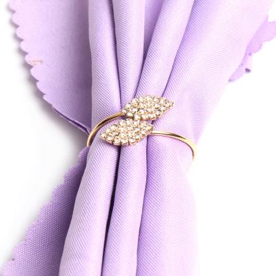 China Viable Hotel Style Simple Napkin Rings Crystal Diamond Two Leaves Napkin Rings Shiny Luxury for sale