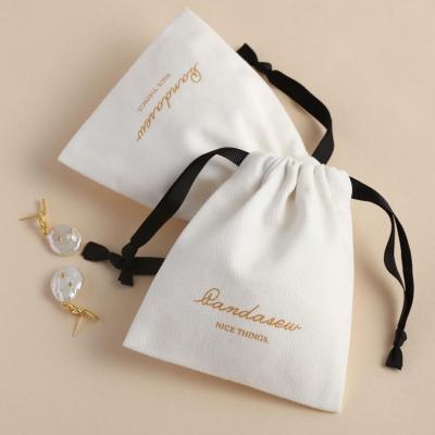 China Recyclable Custom Jewelry Package Pouch With Logo Black Cotton Canvas Pouch Drawstring Bags Personalized Name Printed Jewelry Bag for sale