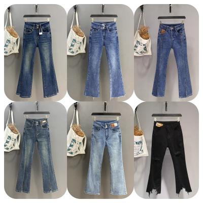 China Breathable Factory direct sale womens clothing high elastic pants hole ripped ladies trousers high waist women flared jeans for sale