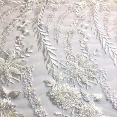 China Viable Pure White Beaded Bridal Crystal Sequins Embroidery Tulle Fabric Wedding Bridal Beaded Lace Fabric For Dress for sale