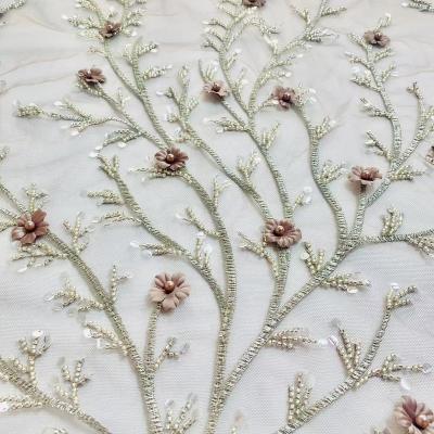 China Viable Elegant Beaded Luxury Beaded Embroidery Sequin Fabric Bridal 100% Polyester Fabric For Dress for sale