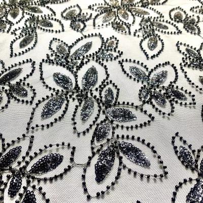 China Newest Viable Elegant African French Tulle Lace Black Handmade Beaded Sequined Bridal Voile Lace Fabric For Dress for sale