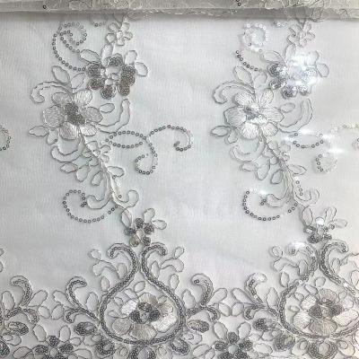 China Hot Selling Viable Wholesale White Rope Lace Fabric Elegant Floral Tied Lace Fabric Sequins For Dress for sale