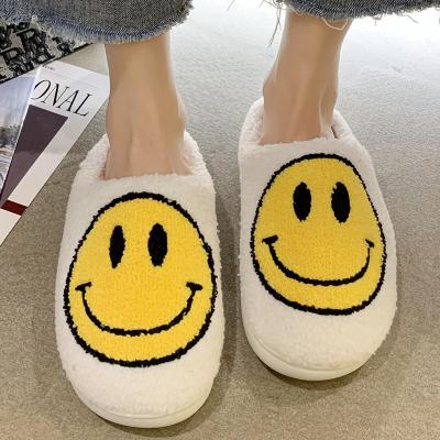 China Fashion Trend Wholesale Ready To Ship Fuzzy Smile Face Fashion Bedroom Slipper Super Fluffy Home Slippers For Spring Autumn Winter for sale