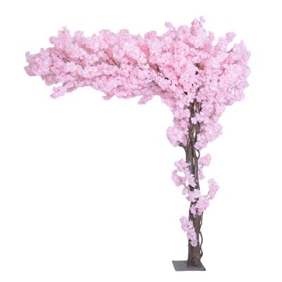 China New Eco-friendly Customized Cheap Artificial Cherry Blossom Tree For Sale Flower Arched Tree For Shopping Mall Decoration for sale