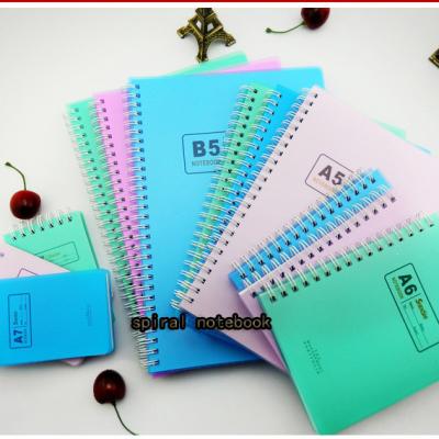 China Custom fancy journal a4 cheap bulk composition spiral bound notebooks a5 a6 a7 b5 printing yellow cover paper plastic cardboard for sale