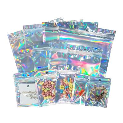 China Logo Custom Printed Bags Aluminum Foil Holographic Moistureproof Zipper Lock Clear Plastic Packaging Mylar Bag For Cosmetic Clothes for sale