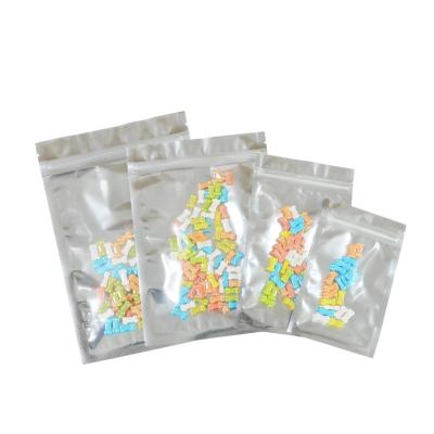 China Transparent Mylar Foil Snack Storage Small Barrier Aluminum Foil Clear Plastic Silver Ziplock Pouch Packaging Clear Mylar Plastic Bag for sale