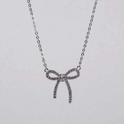 China Romantic OEM/Cute 18k White Gold And Rose Gold Plated Bowknot Necklace With Small Setting Cubic Zirconia for sale