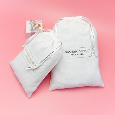 China Large Capacity Flannel Cotton Pouches Luxury Perfume Packaging Pouch Lip Gloss White Recyclable Custom Bag Flannel for sale