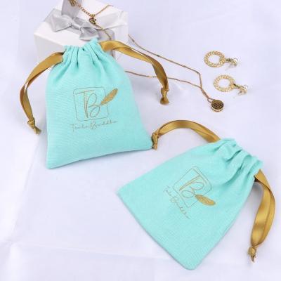 China Custom Recyclable Mini Cotton Canvas Dust Bag Logo Printed Canvas Drawstring Jewelry Pouch Comb Gift Packaging Bag Golden for sale