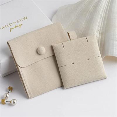 China Customized Logo Customized Jewelry Box With Recyclable Jewelery Pouch Instant Microfiber Button Jewelry Pouch Packaging And Card Insert for sale