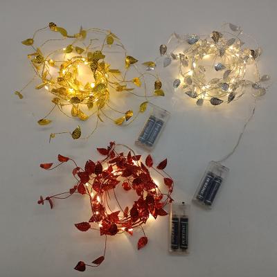 China Metal Leaves Mini String Lights 1.8M Mini Rice Golden Leaves Flower With Fairy LED String Lights Kids Room Decoration for sale