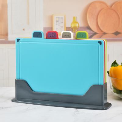 China 4pcs Sustainable Anti Bacteria Multifunctional Household Non-slip Chopping Cutting Board Set With Stand for sale