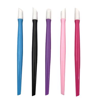 China Exfoliate Rub Rubber Slanted Colorful Nail Nail Remover Handle Nail Art Tool Colorful Plastic Cuticle Pusher for sale