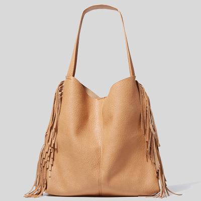 China 2022 Handbag One-Shoulder Large Capacity Women's Bag Tassel Hobo Bag Designer Bags Durable Vagan Leather for sale