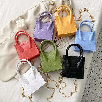 China 2022 ColorJelly Solid Water Resistant Fashionable Small Purses And Handbags Bag For Girls Crocodile PVC Mini Bags for sale