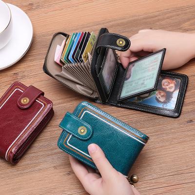 China Genuine Leather Waterproof Ladies Card Holder RFID Blocking Wallets For Woman Large Capacity Shorts Wallet Cashier Vintage for sale