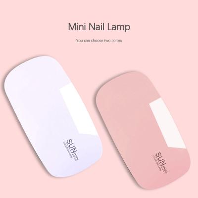 China No Harm Amovol 48W Light Source Sun Mini UV Led Nail Dual Mini Curing Portable Cordless Rechargeable LED Beauty Nail Curing Lamp for sale