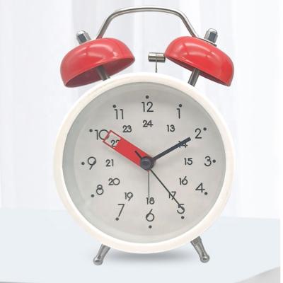 China LUMINOVA 3 inch round table clock metal clock most popular double quartz bell super loud alarm clock factory direct sales for sale