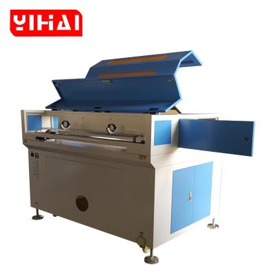 China Laser CUTTING Yihai CNC Laser Cutting Machine for Sponge Eva Foam Board with 80 watt reci laser tube for sale