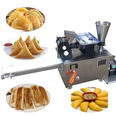 China Can make many styles of 110v/220v automatic steamed food dumpling machine/samosa forming machine/empanada stuffing machine for sale