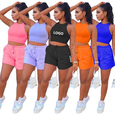 China New Arrivals ARM8288 2022 Summer Solid Color Pink Solid Color Crop Two Piece Set Viable Top Short Sets Women Two Piece Set Clothing for sale