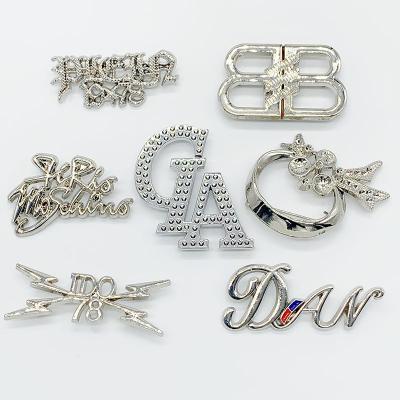 China custom brand 3D Metal Logo For Bag Metal Logo Brands Badge à venda