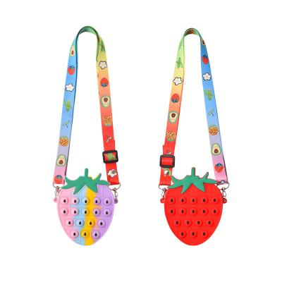 China Relieve Stress Anti-Anxiety Noise Shoulder Bag For Women Girls Big Noise Purse Bags Silicone Strawberry Fruit Noise Itting Bag Toy For Students Kids for sale