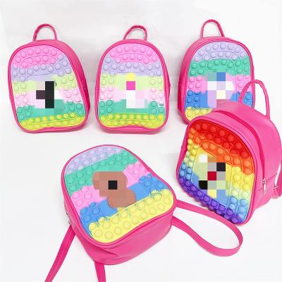 China Relieve Stress Anti-Anxiety Itting Noise Stir Toy Kids Safety Sling Hand Handbags School Book Pack Silicone Bubble Push Unicorn Pop Itting School Backpack for sale