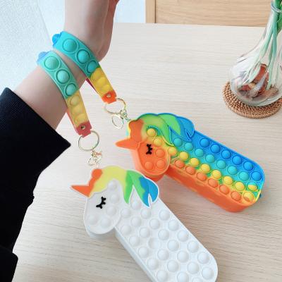 China Cute Unicorn Pop Itting Pencil Case Rainbow Bubble Bags Push Bag Push Bag Pencil Case Durable Custom Silicone Pop Up Pencil Case for sale