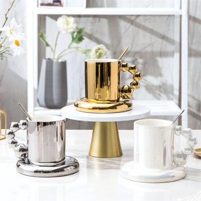 China Viable Luxury Creative Coffee Cup & Saucer Porcelain Star Coffee Cup Gold Silver Gold Tea Cup Nordic Ceramic Cup Set Wedding Birthday Gift for sale